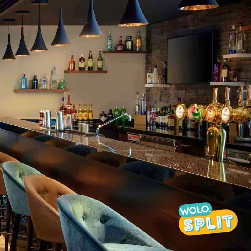 Essential Dubai Central | Fully Loaded Bar at the Hampton by Hilton Dubai Al Seef